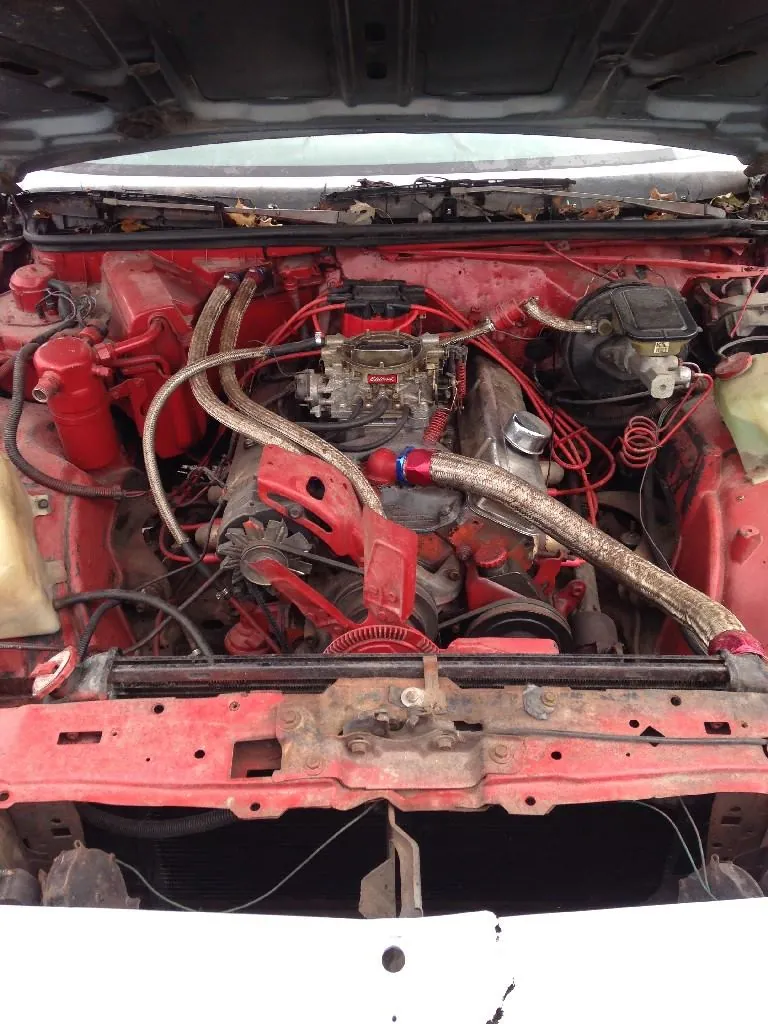 Used engines staged for inspection at an Indianapolis salvage yard — the most valuable part on most junk cars