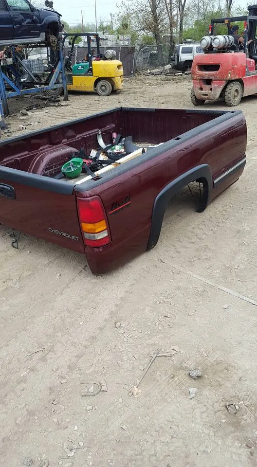 Chevrolet Silverado truck bed separated for parts at the TNCAP salvage facility